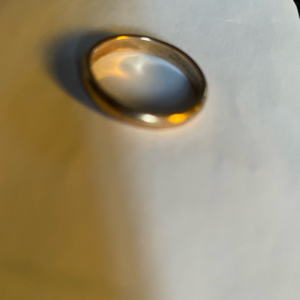 10 karat gold filled unisex ring/band. Approximately size 9